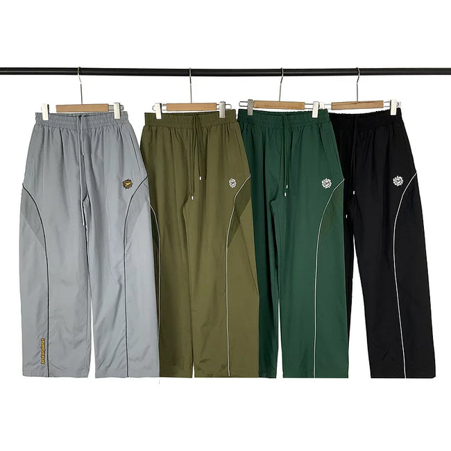 Broken Planet Curved Panel Nylon Track Pants - 4 Colors Available Hover Image