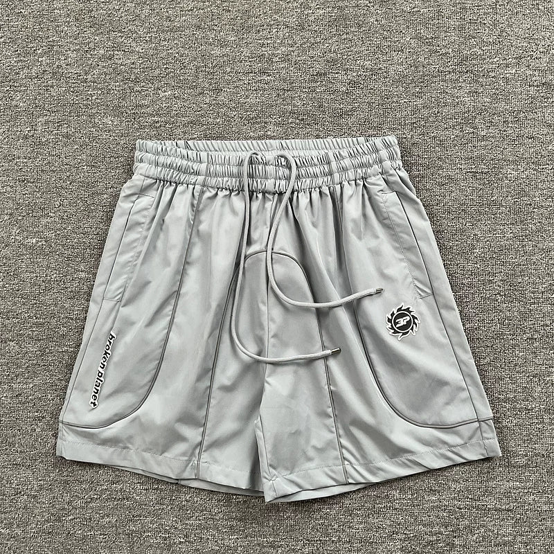 Broken Planet Reflective Piping Nylon Shorts - 3 Colors Available