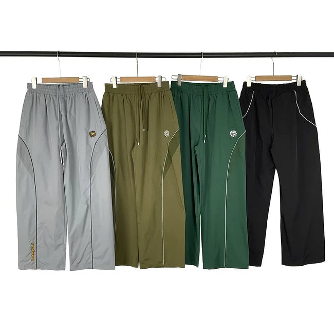 Broken Planet Curved Panel Nylon Track Pants - 4 Colors Available Main Image
